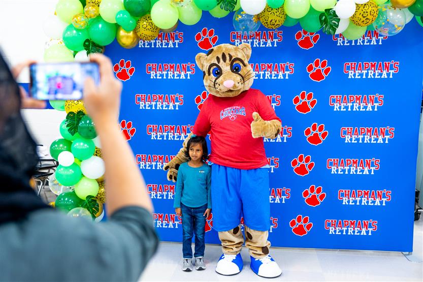 Students build a cheetah at a community event